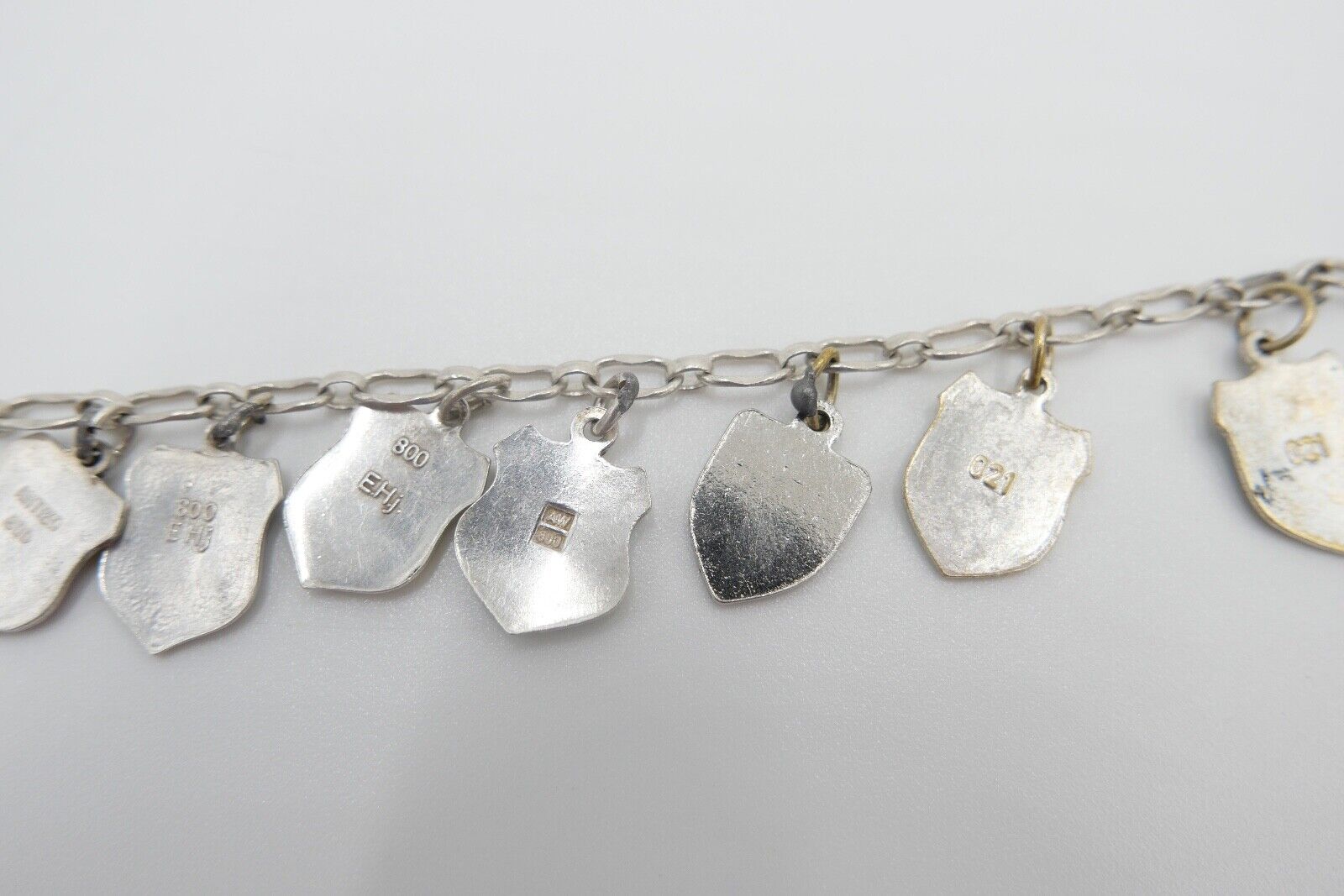 Bettelarmband mit Städte Wappen aus Emaille 800 Silber REU ANTIKO EHJ - Antikhandel-Stuttgart