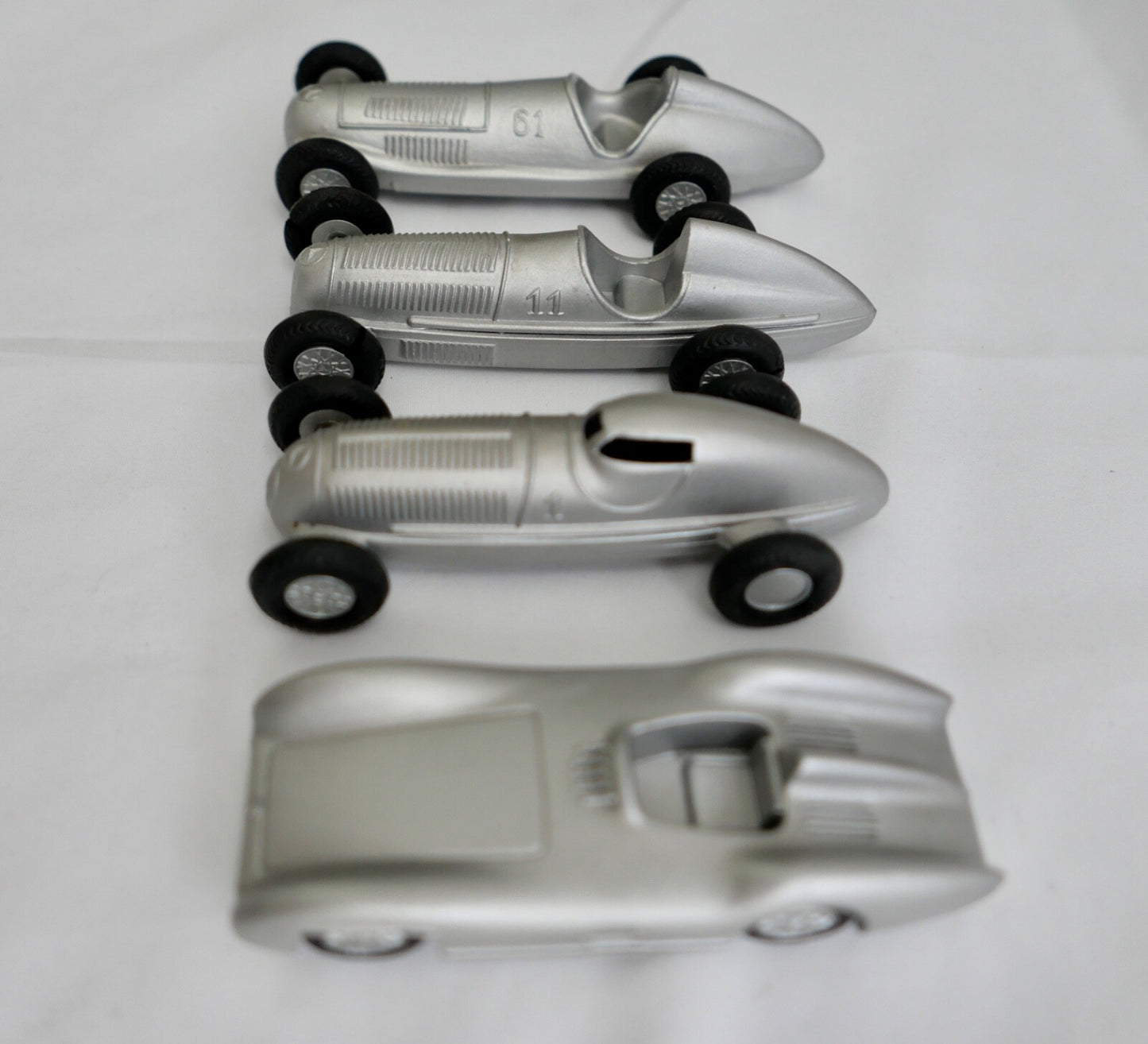 4x Märklin Mercedes Rennwagen W25  W25B  W154 W196 Stromlinie usw.