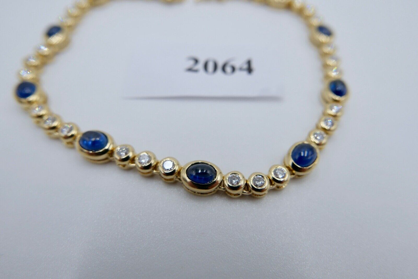 80er Jahre 750 Gelbgold Damen Tennisarmband mit 30x Brillant & 10x Saphir 6,5 Ct - Antikhandel-Stuttgart