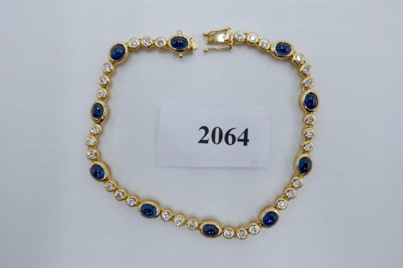 80er Jahre 750 Gelbgold Damen Tennisarmband mit 30x Brillant & 10x Saphir 6,5 Ct - Antikhandel-Stuttgart