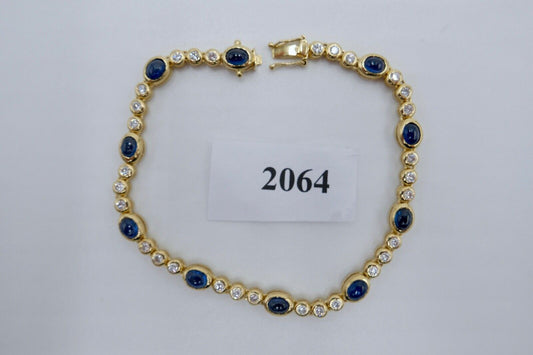 80er Jahre 750 Gelbgold Damen Tennisarmband mit 30x Brillant & 10x Saphir 6,5 Ct - Antikhandel-Stuttgart