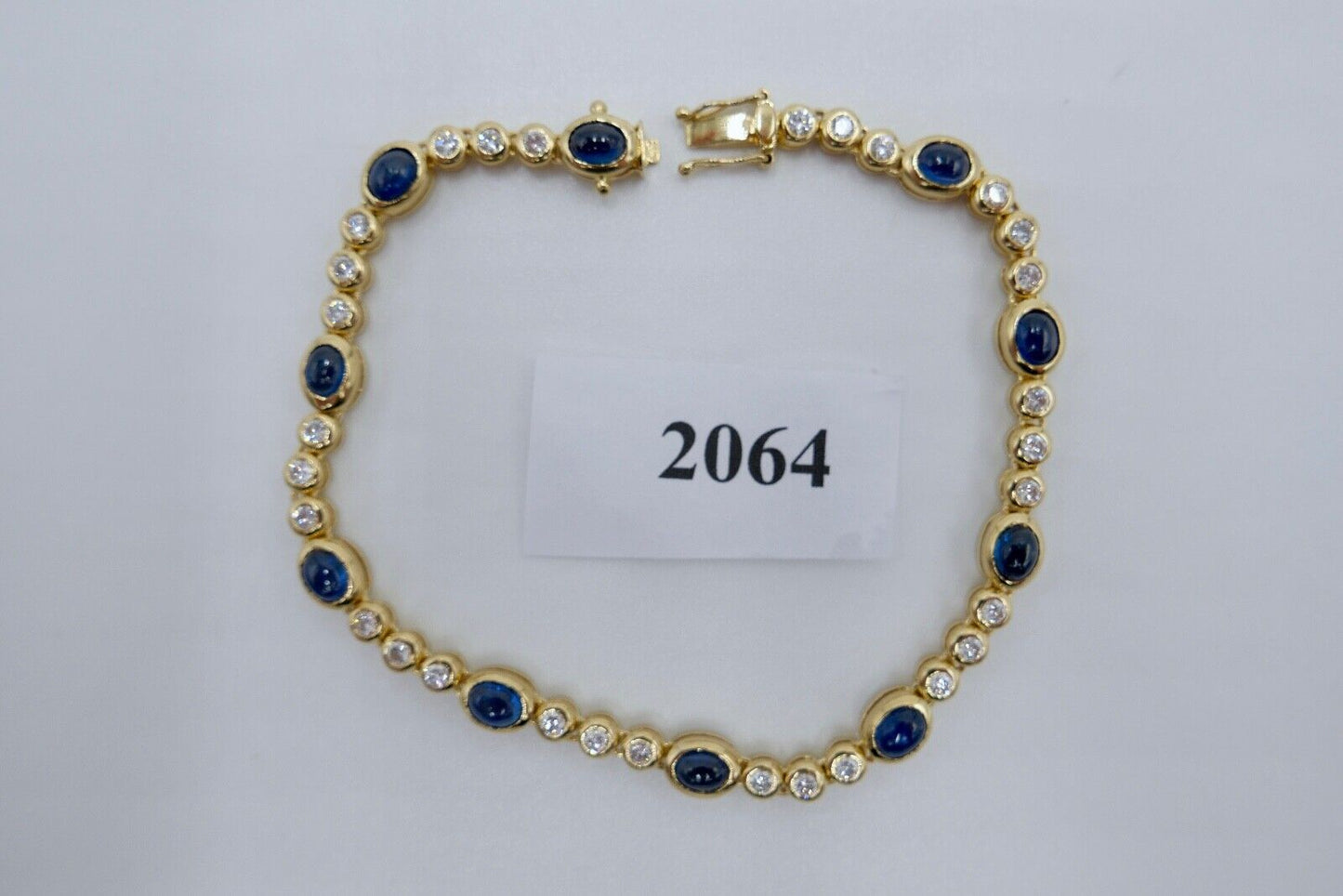 80er Jahre 750 Gelbgold Damen Tennisarmband mit 30x Brillant & 10x Saphir 6,5 Ct - Antikhandel-Stuttgart