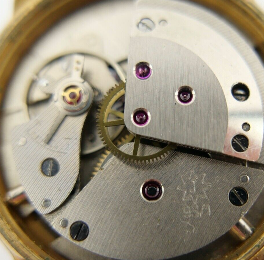 Junghans Cal. J 93/1 " Trilastic " Herren Armbanduhr Gold farbig Ø 33 mm - Antikhandel-Stuttgart