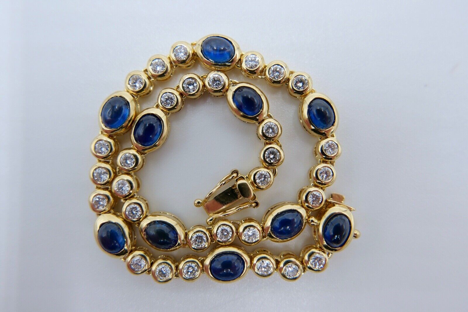 80er Jahre 750 Gelbgold Damen Tennisarmband mit 30x Brillant & 10x Saphir 6,5 Ct - Antikhandel-Stuttgart