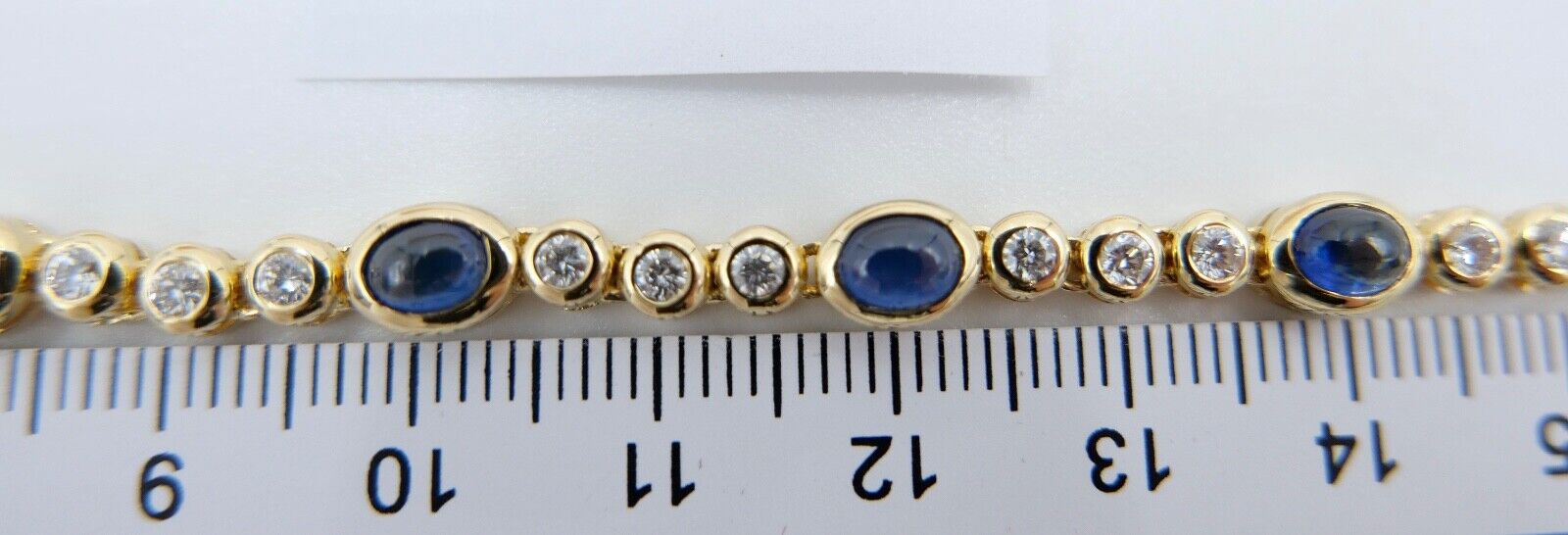 80er Jahre 750 Gelbgold Damen Tennisarmband mit 30x Brillant & 10x Saphir 6,5 Ct - Antikhandel-Stuttgart