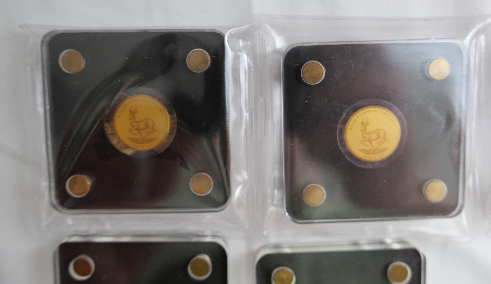 5 x Goldmünzen 3000 Francs 1/500 oz 2019 Mauerfall Springbock Brandenburger Tor