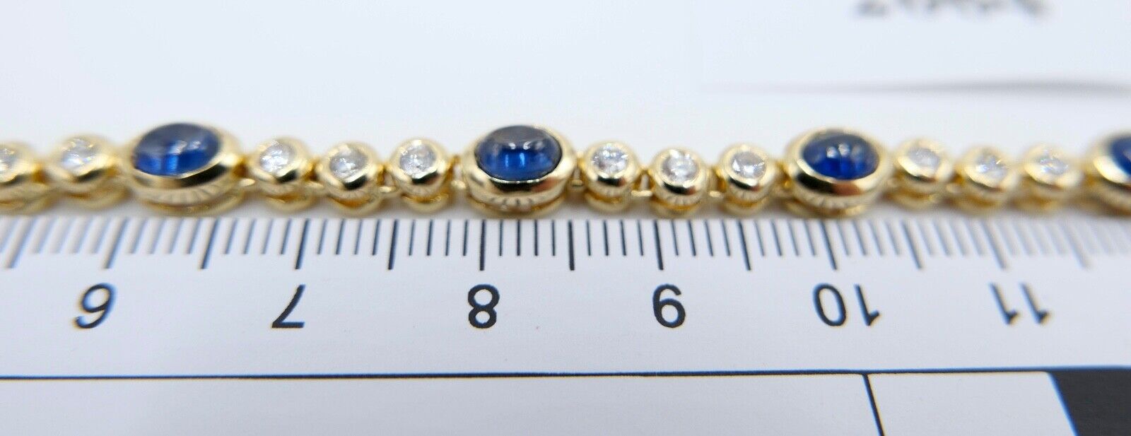 80er Jahre 750 Gelbgold Damen Tennisarmband mit 30x Brillant & 10x Saphir 6,5 Ct - Antikhandel-Stuttgart