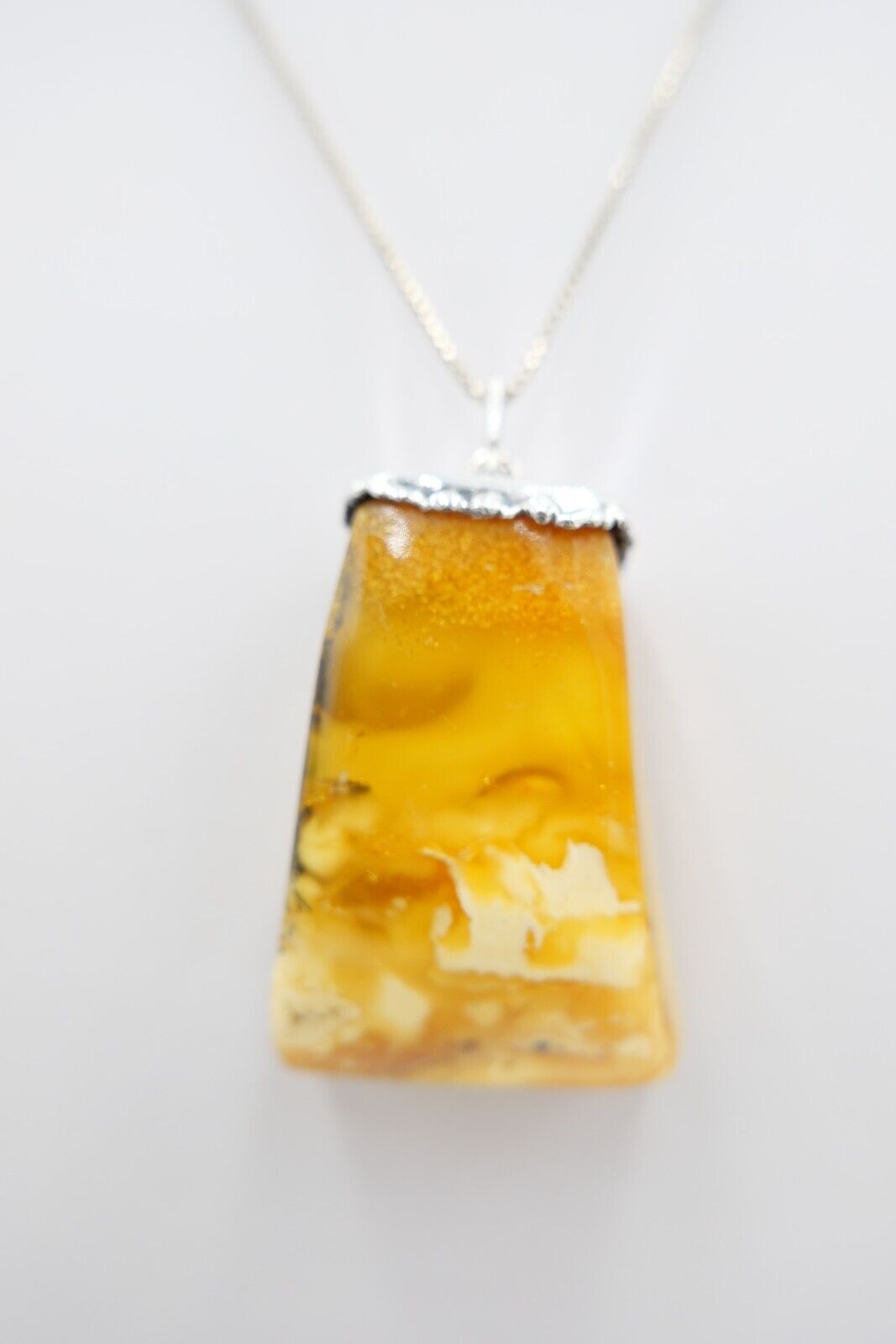 Alter Bernstein Anhänger mit Silbermontur butterscotch Silber - Antikhandel-Stuttgart