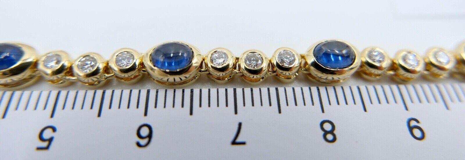 80er Jahre 750 Gelbgold Damen Tennisarmband mit 30x Brillant & 10x Saphir 6,5 Ct - Antikhandel-Stuttgart