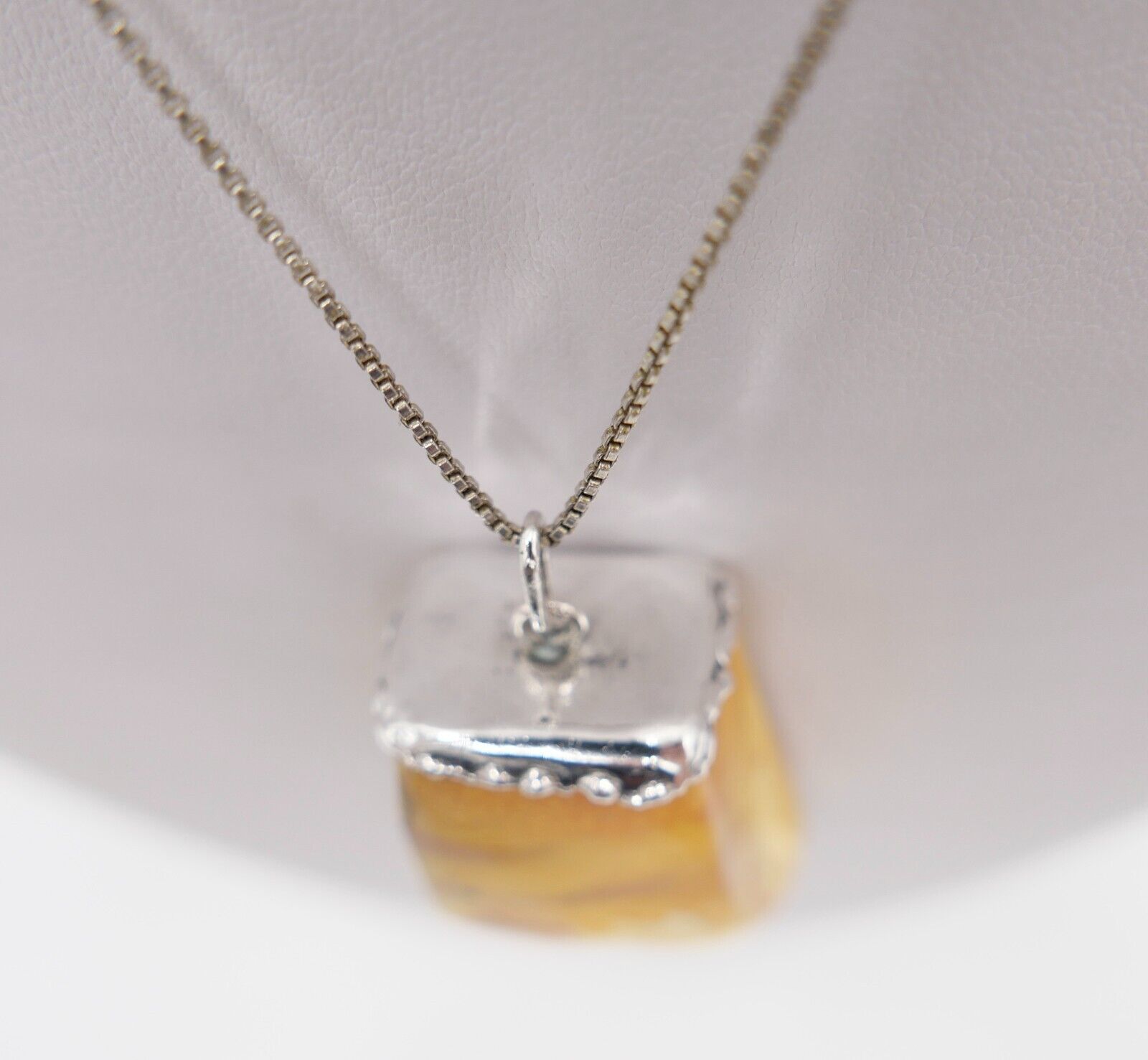 Alter Bernstein Anhänger mit Silbermontur butterscotch Silber - Antikhandel-Stuttgart