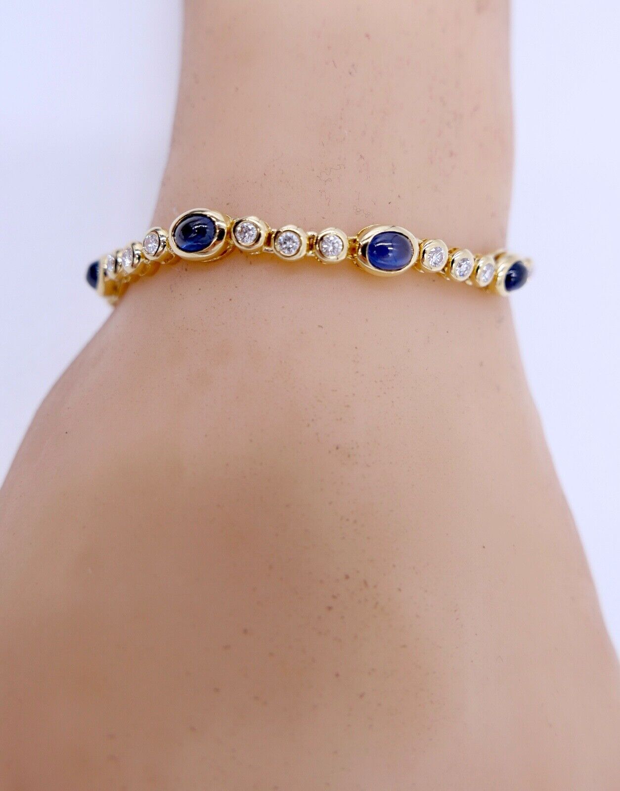 80er Jahre 750 Gelbgold Damen Tennisarmband mit 30x Brillant & 10x Saphir 6,5 Ct - Antikhandel-Stuttgart