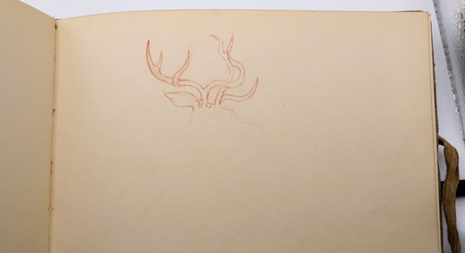 Skizzenbuch mit Tier‑ und Frauenzeichnungen 1939 mit handschriftlichen Gedichten