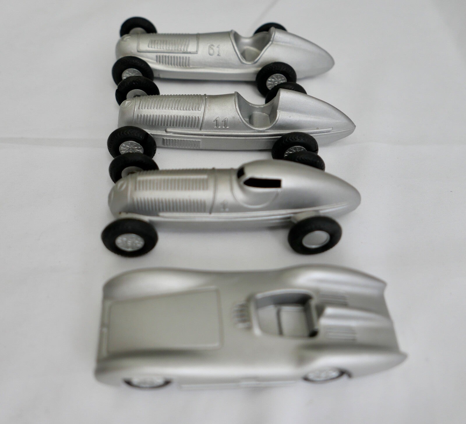 4x Märklin Mercedes Rennwagen W25  W25B  W154 W196 Stromlinie usw.