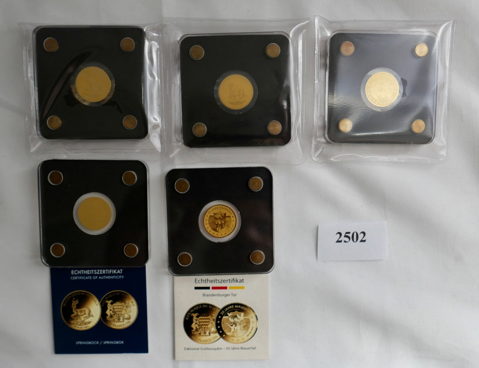 5 x Goldmünzen 3000 Francs 1/500 oz 2019 Mauerfall Springbock Brandenburger Tor