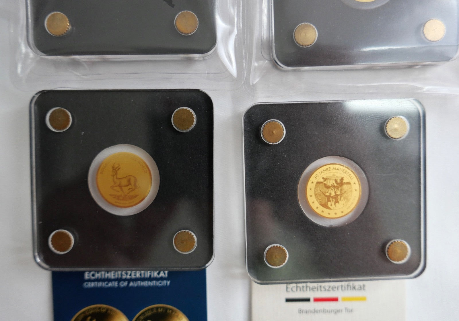 5 x Goldmünzen 3000 Francs 1/500 oz 2019 Mauerfall Springbock Brandenburger Tor