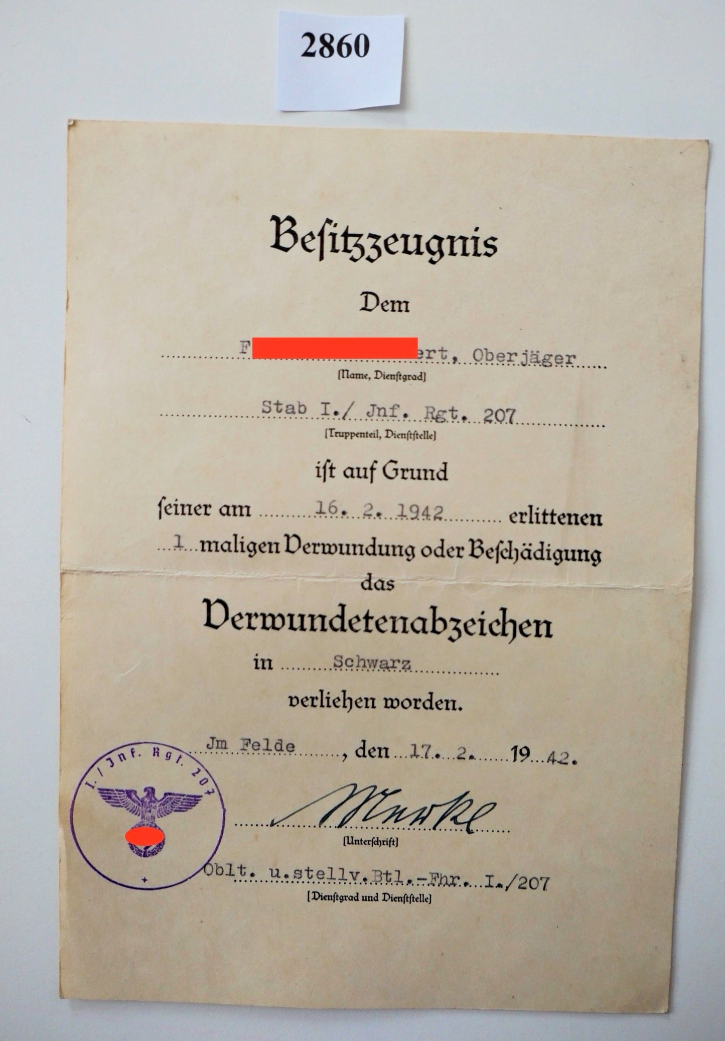 Besitzzeugnis Oberjäger Verwundetenabzeichen in Schwarz 1942 Rgt. 207